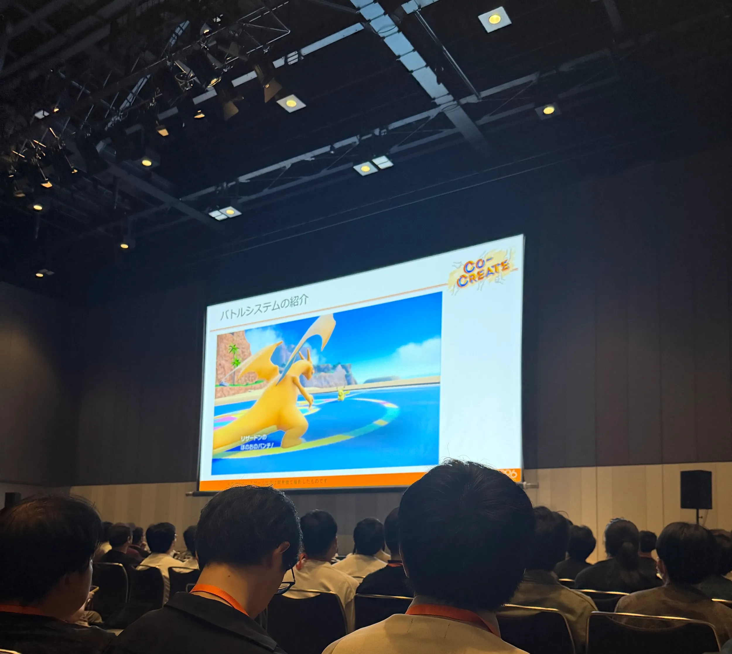 Photo: Photo of a slide deck at the Pokemon battle system at CEDEC
